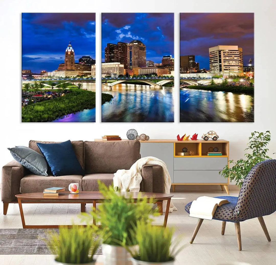 Columbus City Lights Night Bright Blue Cloudy Skyline Cityscape View Wall Art Canvas Print, gallery wrapped on museum-quality canvas, reflecting on a river.