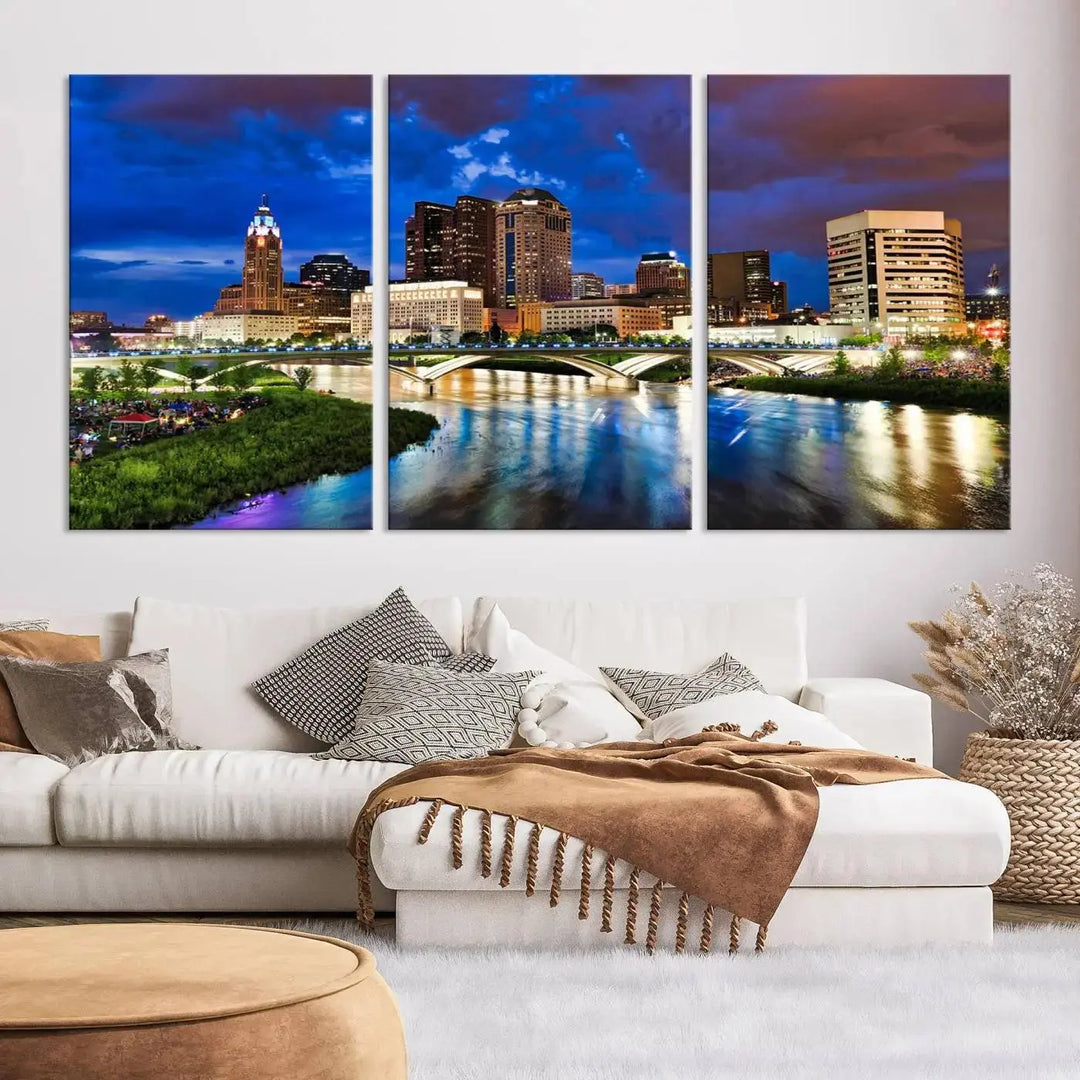 Columbus City Lights Night Bright Blue Cloudy Skyline Cityscape View Wall Art Canvas Print, gallery wrapped on museum-quality canvas, reflecting on a river.