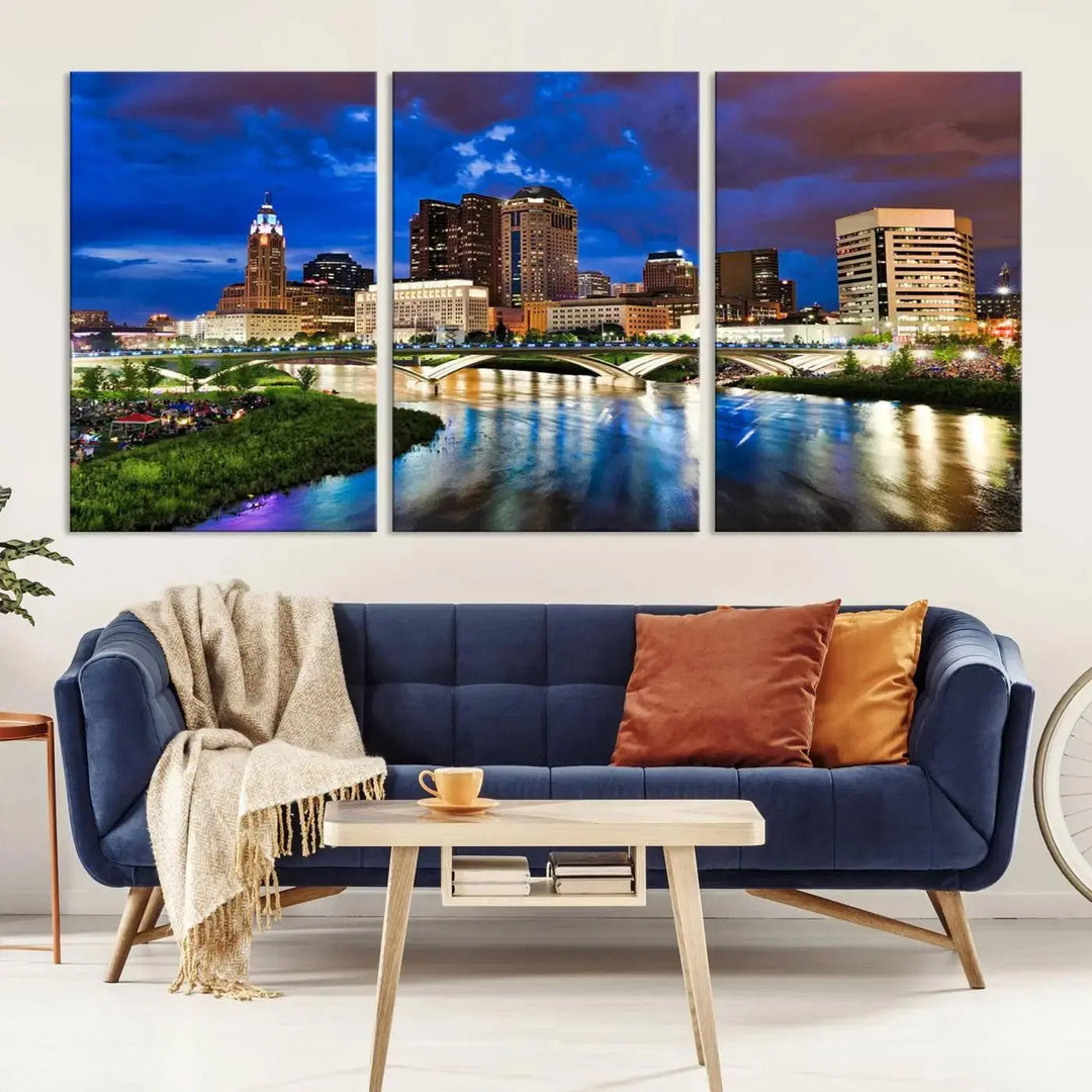 Columbus City Lights Night Bright Blue Cloudy Skyline Cityscape View Wall Art Canvas Print, gallery wrapped on museum-quality canvas, reflecting on a river.