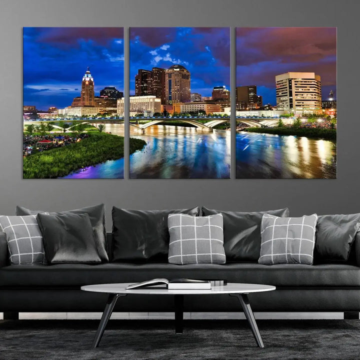 Columbus City Lights Night Bright Blue Cloudy Skyline Cityscape View Wall Art Canvas Print, gallery wrapped on museum-quality canvas, reflecting on a river.