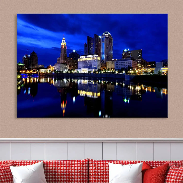 The living room showcases the Columbus City Lights Night Bright Blue Skyline Cityscape View Wall Art Canvas Print on a museum-quality canvas. The professionally hand-assembled artwork adds elegance while ensuring durable beauty.