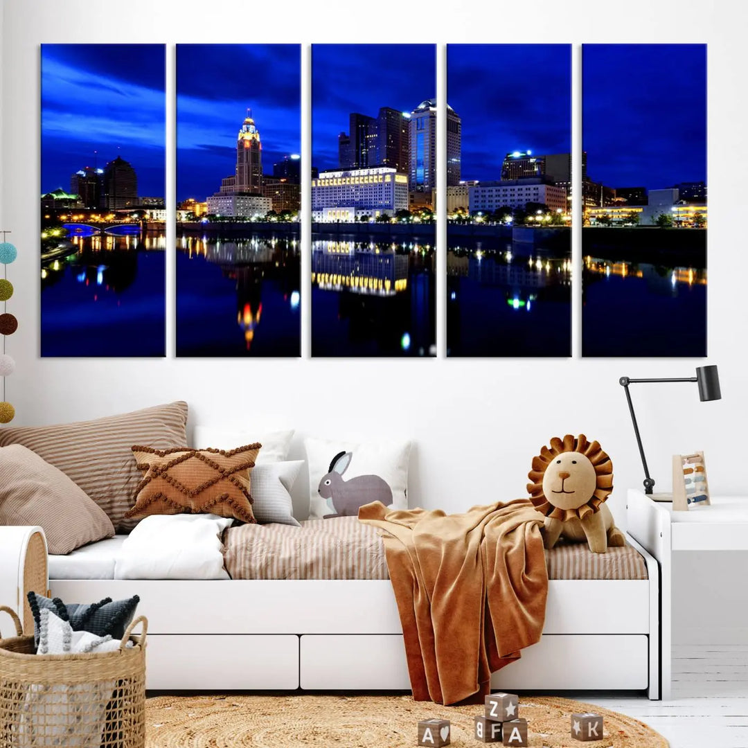 The living room showcases the Columbus City Lights Night Bright Blue Skyline Cityscape View Wall Art Canvas Print on a museum-quality canvas. The professionally hand-assembled artwork adds elegance while ensuring durable beauty.