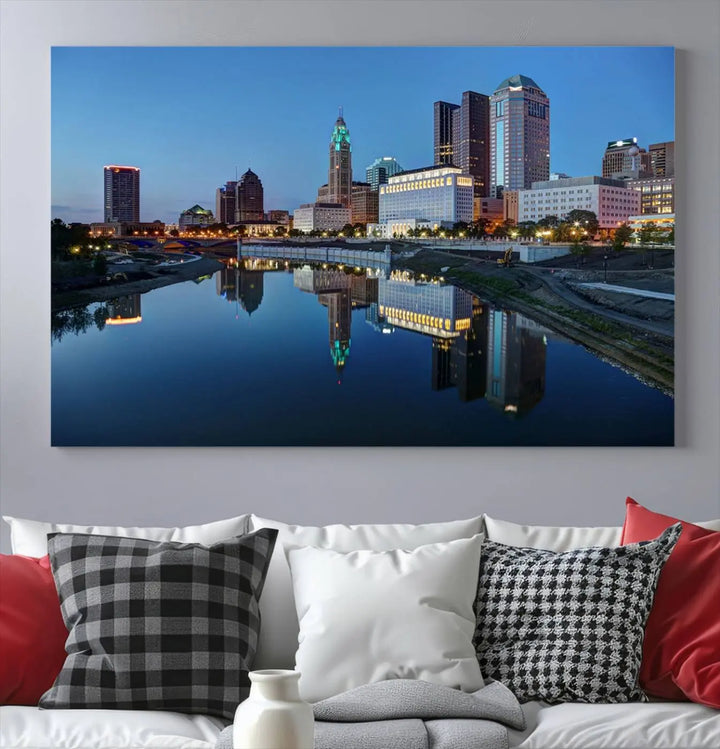 Enhance your modern dining area with the "Columbus City Lights Night Skyline Cityscape View Wall Art Canvas Print," capturing an urban scene of a cityscape mirrored on a tranquil river at dusk. This museum-quality canvas includes a UV-protective coating, guaranteeing its long-lasting brilliance. Enjoy free shipping while adding this piece of urban tranquility to your home.