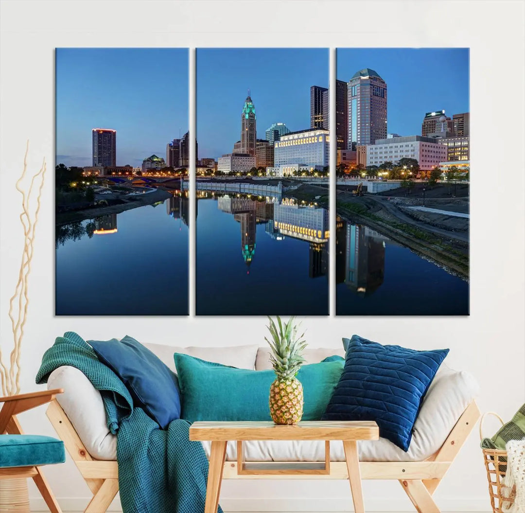 Enhance your modern dining area with the "Columbus City Lights Night Skyline Cityscape View Wall Art Canvas Print," capturing an urban scene of a cityscape mirrored on a tranquil river at dusk. This museum-quality canvas includes a UV-protective coating, guaranteeing its long-lasting brilliance. Enjoy free shipping while adding this piece of urban tranquility to your home.