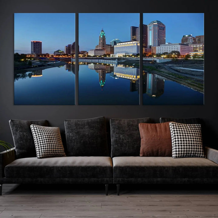 Enhance your modern dining area with the "Columbus City Lights Night Skyline Cityscape View Wall Art Canvas Print," capturing an urban scene of a cityscape mirrored on a tranquil river at dusk. This museum-quality canvas includes a UV-protective coating, guaranteeing its long-lasting brilliance. Enjoy free shipping while adding this piece of urban tranquility to your home.