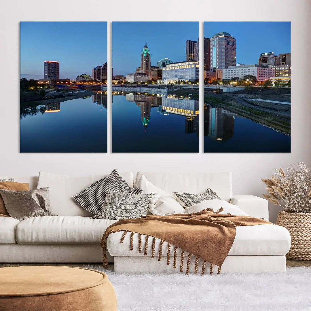 Enhance your modern dining area with the "Columbus City Lights Night Skyline Cityscape View Wall Art Canvas Print," capturing an urban scene of a cityscape mirrored on a tranquil river at dusk. This museum-quality canvas includes a UV-protective coating, guaranteeing its long-lasting brilliance. Enjoy free shipping while adding this piece of urban tranquility to your home.