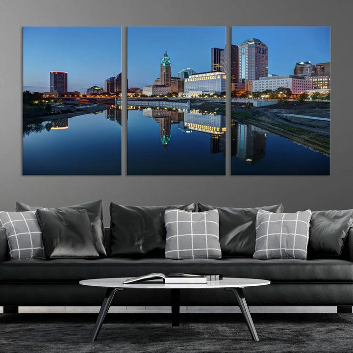 Enhance your modern dining area with the "Columbus City Lights Night Skyline Cityscape View Wall Art Canvas Print," capturing an urban scene of a cityscape mirrored on a tranquil river at dusk. This museum-quality canvas includes a UV-protective coating, guaranteeing its long-lasting brilliance. Enjoy free shipping while adding this piece of urban tranquility to your home.