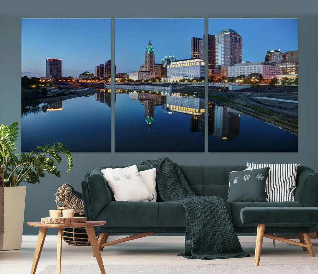 Enhance your modern dining area with the "Columbus City Lights Night Skyline Cityscape View Wall Art Canvas Print," capturing an urban scene of a cityscape mirrored on a tranquil river at dusk. This museum-quality canvas includes a UV-protective coating, guaranteeing its long-lasting brilliance. Enjoy free shipping while adding this piece of urban tranquility to your home.