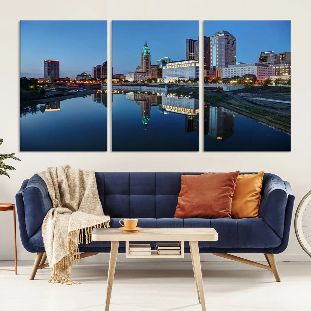 Enhance your modern dining area with the "Columbus City Lights Night Skyline Cityscape View Wall Art Canvas Print," capturing an urban scene of a cityscape mirrored on a tranquil river at dusk. This museum-quality canvas includes a UV-protective coating, guaranteeing its long-lasting brilliance. Enjoy free shipping while adding this piece of urban tranquility to your home.