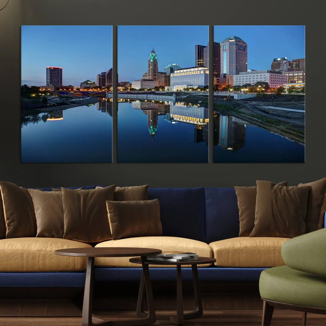 Enhance your modern dining area with the "Columbus City Lights Night Skyline Cityscape View Wall Art Canvas Print," capturing an urban scene of a cityscape mirrored on a tranquil river at dusk. This museum-quality canvas includes a UV-protective coating, guaranteeing its long-lasting brilliance. Enjoy free shipping while adding this piece of urban tranquility to your home.