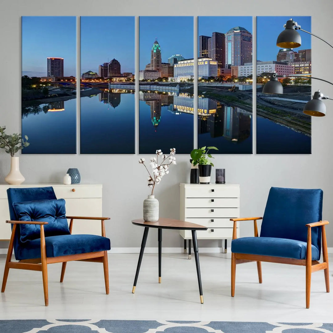 Enhance your modern dining area with the "Columbus City Lights Night Skyline Cityscape View Wall Art Canvas Print," capturing an urban scene of a cityscape mirrored on a tranquil river at dusk. This museum-quality canvas includes a UV-protective coating, guaranteeing its long-lasting brilliance. Enjoy free shipping while adding this piece of urban tranquility to your home.