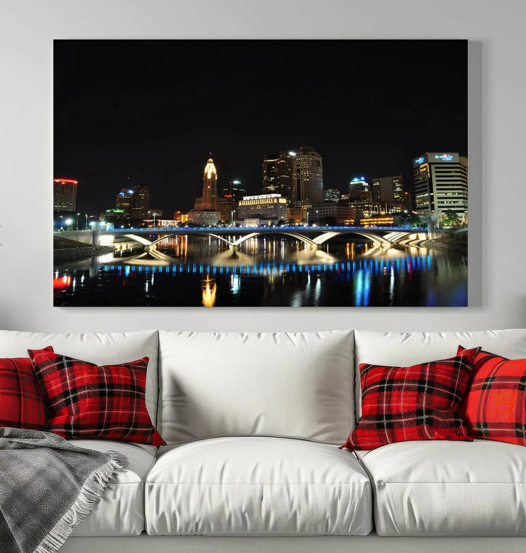 The "Columbus City Lights Night Skyline Cityscape View Wall Art Canvas Print" adorns the living room wall. This artwork, with its vibrant depiction of a night view, is gallery wrapped on museum-quality canvas, enhancing the room's elegance.