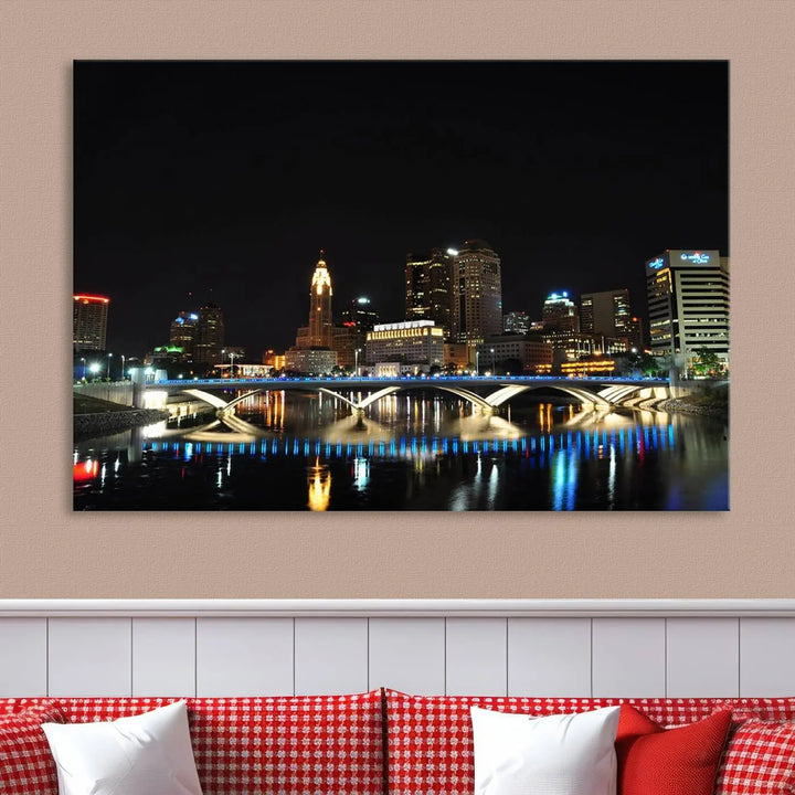 The "Columbus City Lights Night Skyline Cityscape View Wall Art Canvas Print" adorns the living room wall. This artwork, with its vibrant depiction of a night view, is gallery wrapped on museum-quality canvas, enhancing the room's elegance.