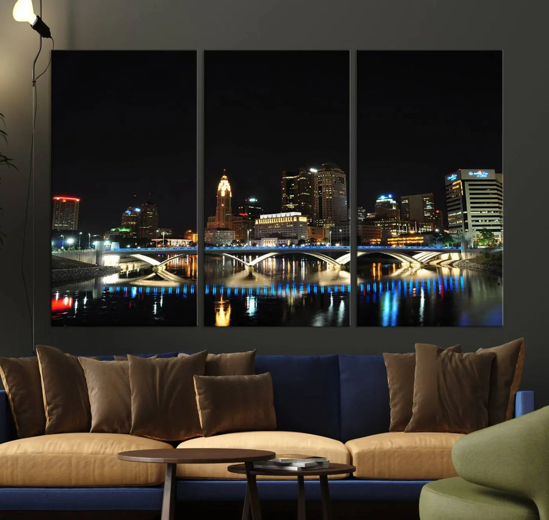 The "Columbus City Lights Night Skyline Cityscape View Wall Art Canvas Print" adorns the living room wall. This artwork, with its vibrant depiction of a night view, is gallery wrapped on museum-quality canvas, enhancing the room's elegance.