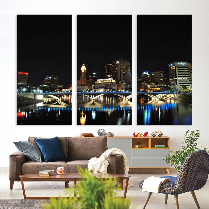 The "Columbus City Lights Night Skyline Cityscape View Wall Art Canvas Print" adorns the living room wall. This artwork, with its vibrant depiction of a night view, is gallery wrapped on museum-quality canvas, enhancing the room's elegance.