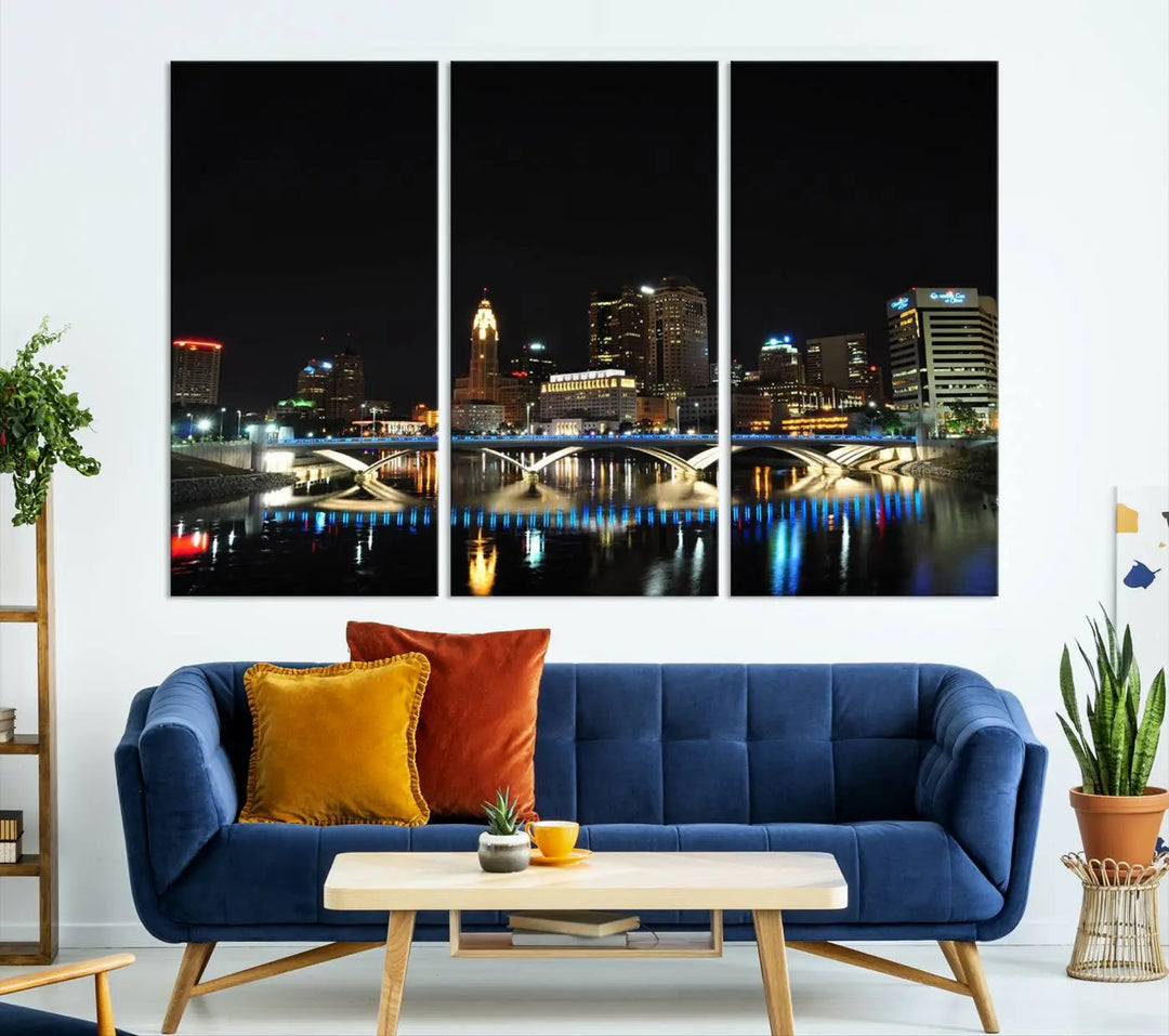 The "Columbus City Lights Night Skyline Cityscape View Wall Art Canvas Print" adorns the living room wall. This artwork, with its vibrant depiction of a night view, is gallery wrapped on museum-quality canvas, enhancing the room's elegance.