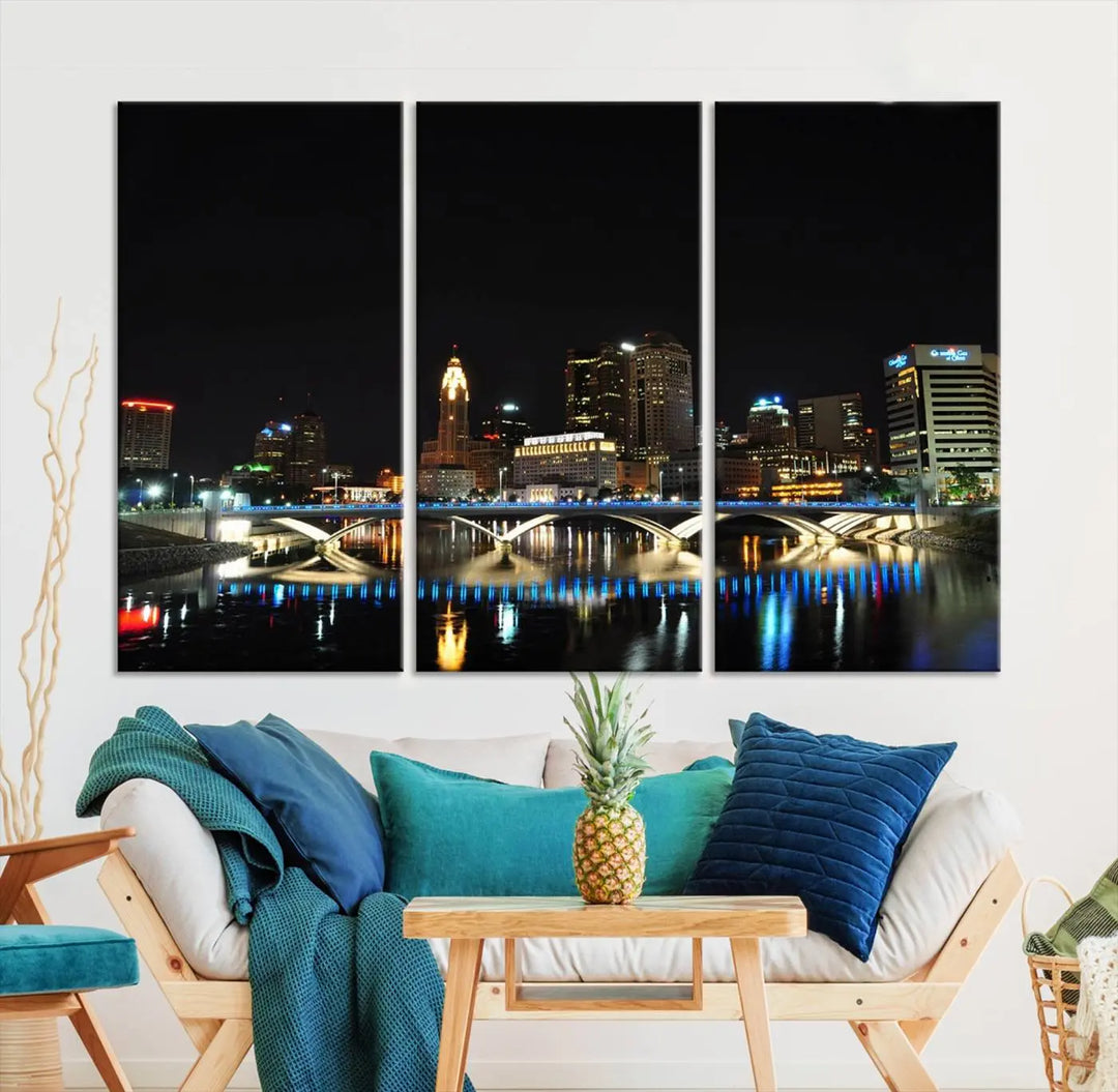 The "Columbus City Lights Night Skyline Cityscape View Wall Art Canvas Print" adorns the living room wall. This artwork, with its vibrant depiction of a night view, is gallery wrapped on museum-quality canvas, enhancing the room's elegance.