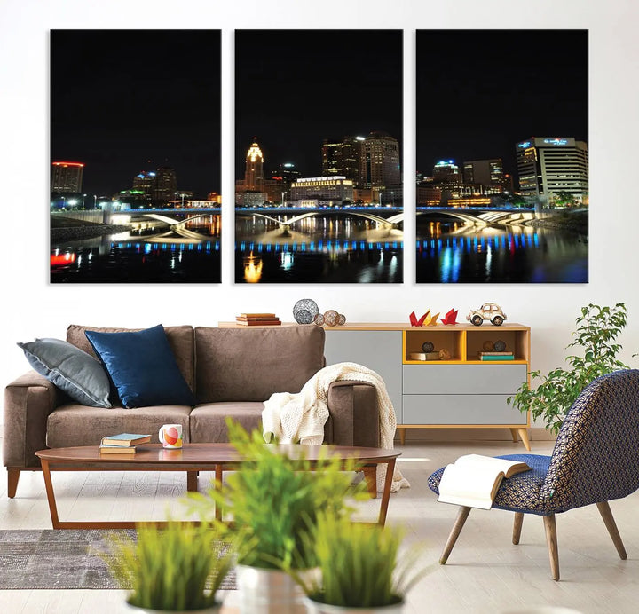 The "Columbus City Lights Night Skyline Cityscape View Wall Art Canvas Print" adorns the living room wall. This artwork, with its vibrant depiction of a night view, is gallery wrapped on museum-quality canvas, enhancing the room's elegance.