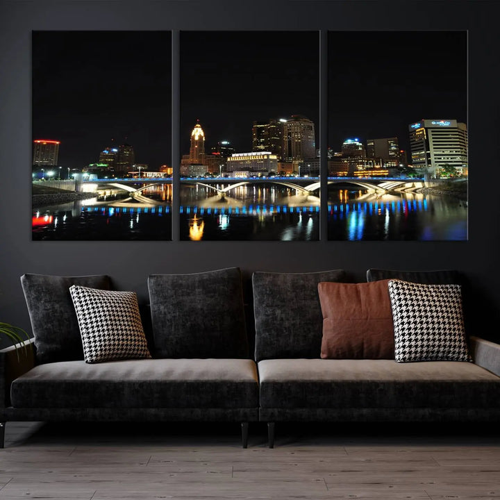 The "Columbus City Lights Night Skyline Cityscape View Wall Art Canvas Print" adorns the living room wall. This artwork, with its vibrant depiction of a night view, is gallery wrapped on museum-quality canvas, enhancing the room's elegance.