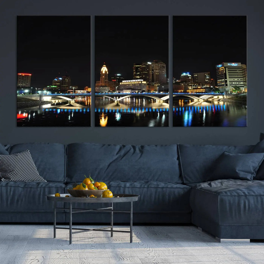 The "Columbus City Lights Night Skyline Cityscape View Wall Art Canvas Print" adorns the living room wall. This artwork, with its vibrant depiction of a night view, is gallery wrapped on museum-quality canvas, enhancing the room's elegance.