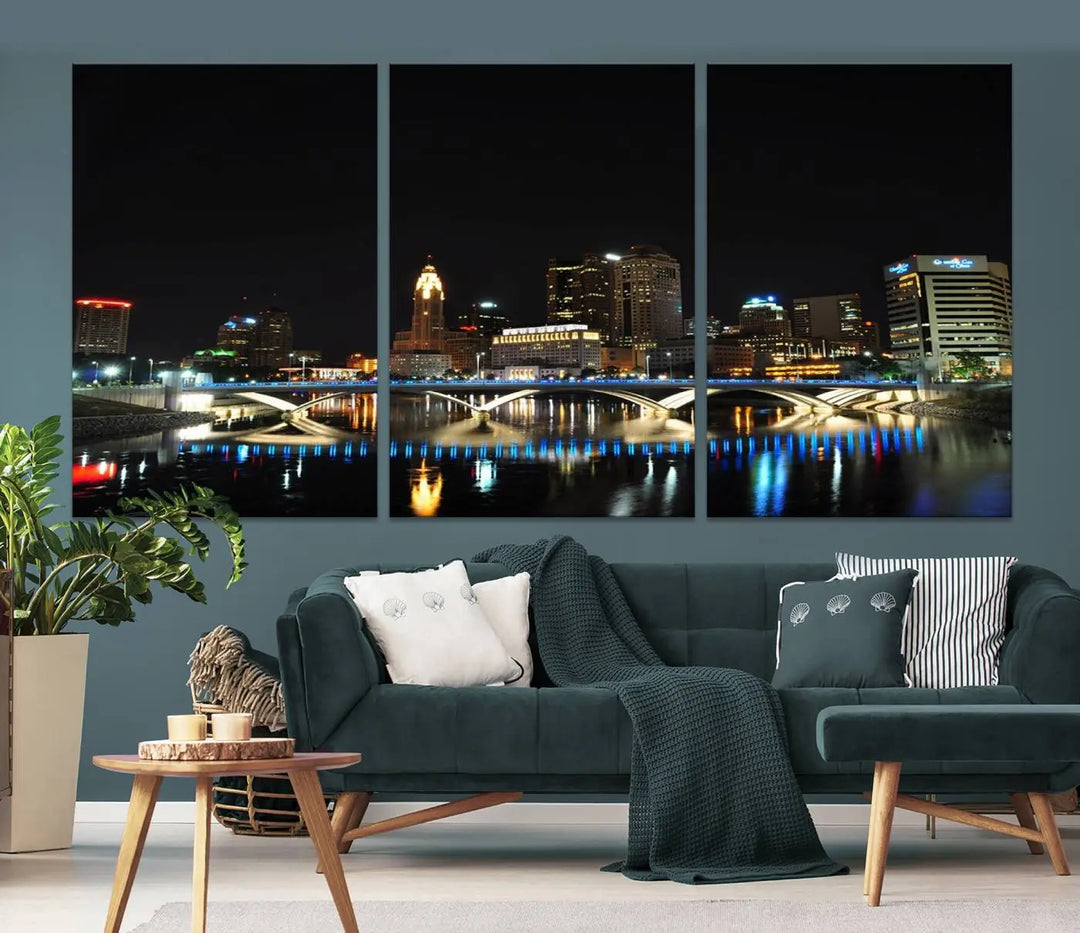 The "Columbus City Lights Night Skyline Cityscape View Wall Art Canvas Print" adorns the living room wall. This artwork, with its vibrant depiction of a night view, is gallery wrapped on museum-quality canvas, enhancing the room's elegance.