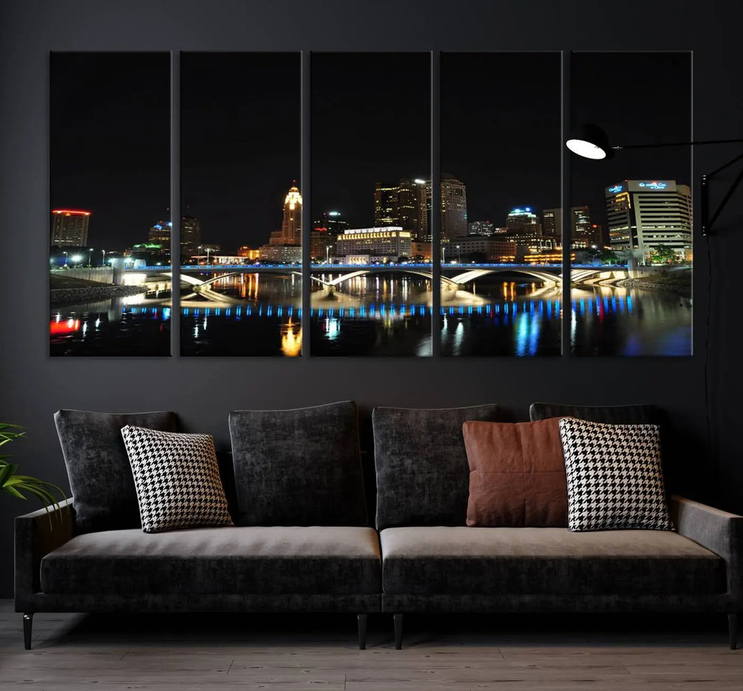 The "Columbus City Lights Night Skyline Cityscape View Wall Art Canvas Print" adorns the living room wall. This artwork, with its vibrant depiction of a night view, is gallery wrapped on museum-quality canvas, enhancing the room's elegance.