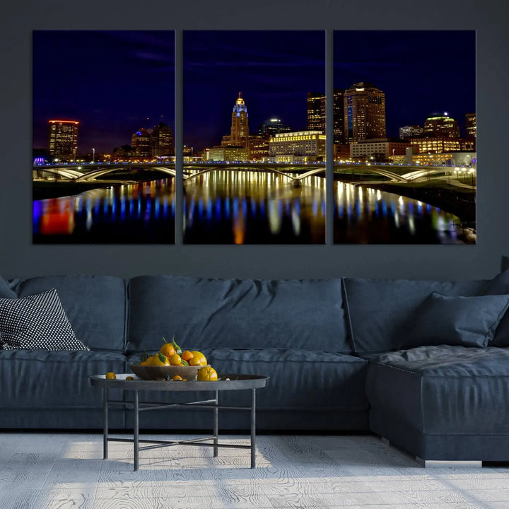 The "Columbus City Lights Night Skyline Cityscape View Wall Art Canvas Print" showcases a stunning city skyline at night, with illuminated buildings and bridges reflecting in the river, on a museum-quality canvas ready to hang.