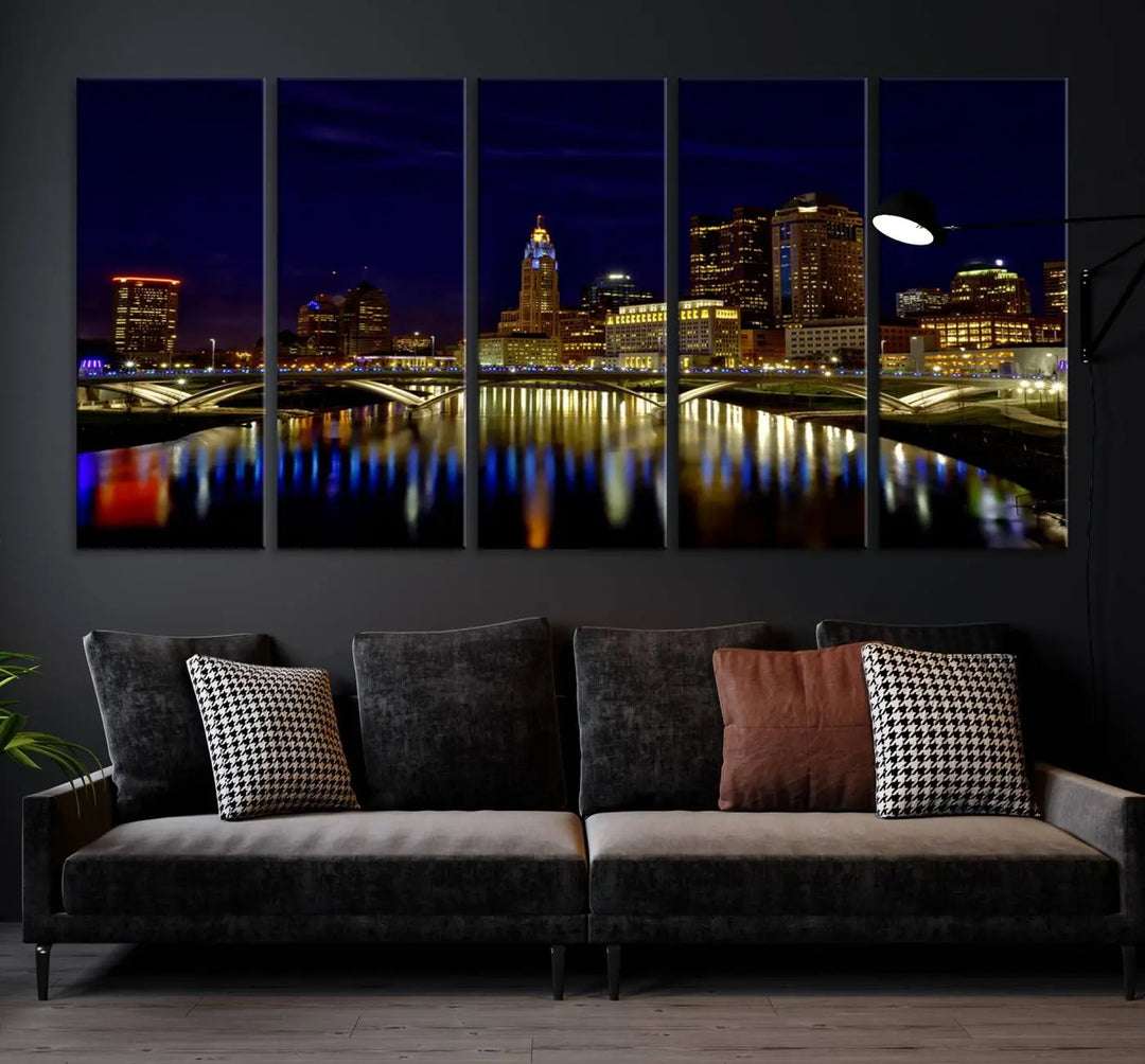 The "Columbus City Lights Night Skyline Cityscape View Wall Art Canvas Print" showcases a stunning city skyline at night, with illuminated buildings and bridges reflecting in the river, on a museum-quality canvas ready to hang.