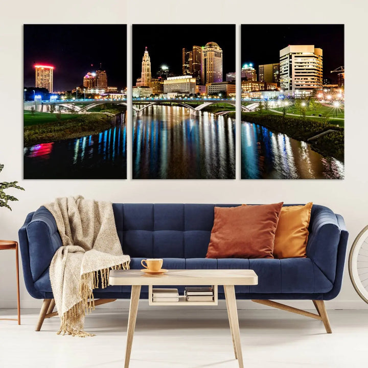 A triptych of the Columbus City Lights Night Skyline Cityscape View Wall Art Canvas Print is displayed, serving as a striking focal point in the room.