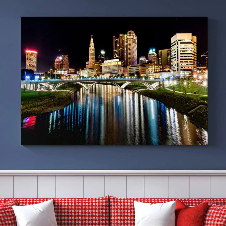 A triptych of the Columbus City Lights Night Skyline Cityscape View Wall Art Canvas Print is displayed, serving as a striking focal point in the room.