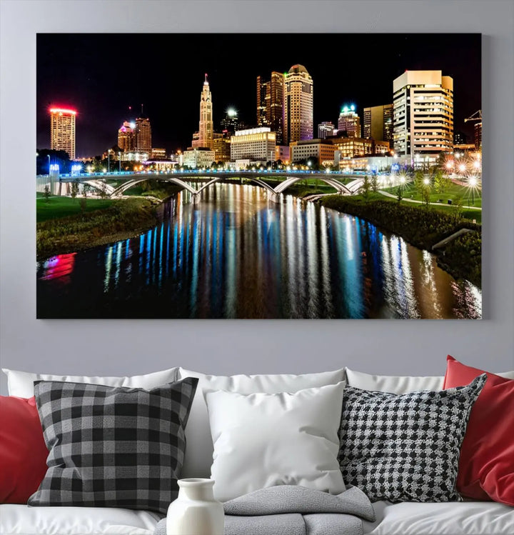 A triptych of the Columbus City Lights Night Skyline Cityscape View Wall Art Canvas Print is displayed, serving as a striking focal point in the room.