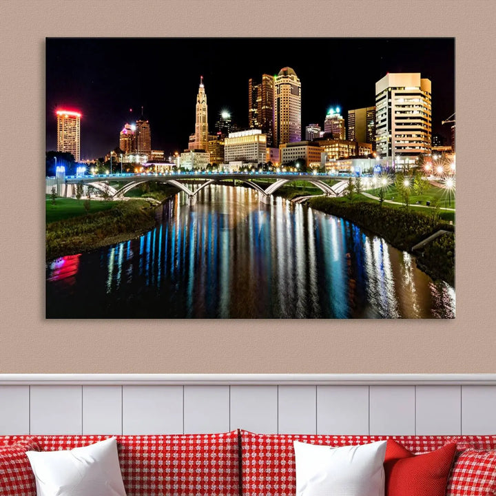 A triptych of the Columbus City Lights Night Skyline Cityscape View Wall Art Canvas Print is displayed, serving as a striking focal point in the room.