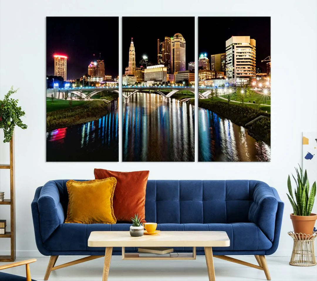 A triptych of the Columbus City Lights Night Skyline Cityscape View Wall Art Canvas Print is displayed, serving as a striking focal point in the room.