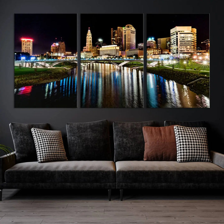 A triptych of the Columbus City Lights Night Skyline Cityscape View Wall Art Canvas Print is displayed, serving as a striking focal point in the room.