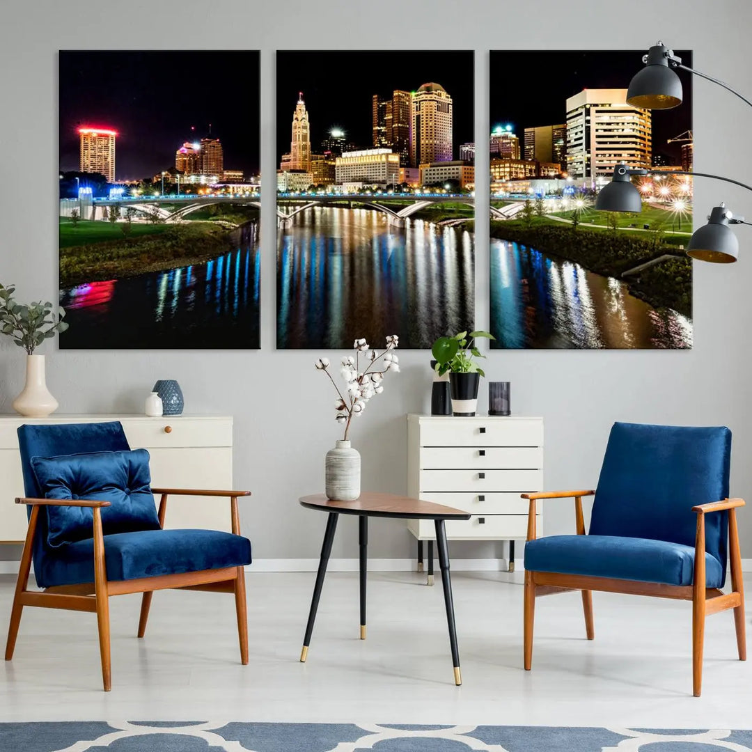 A triptych of the Columbus City Lights Night Skyline Cityscape View Wall Art Canvas Print is displayed, serving as a striking focal point in the room.