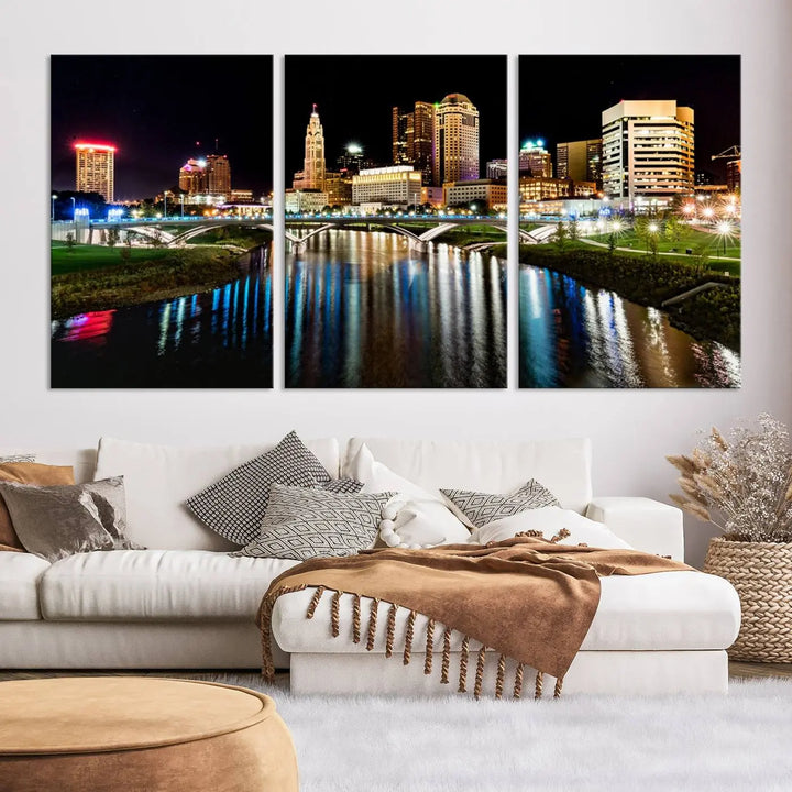 A triptych of the Columbus City Lights Night Skyline Cityscape View Wall Art Canvas Print is displayed, serving as a striking focal point in the room.