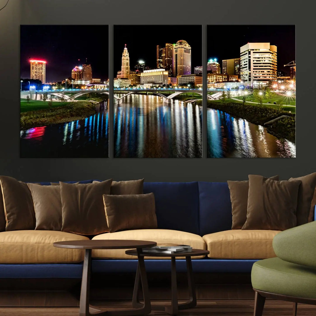 A triptych of the Columbus City Lights Night Skyline Cityscape View Wall Art Canvas Print is displayed, serving as a striking focal point in the room.