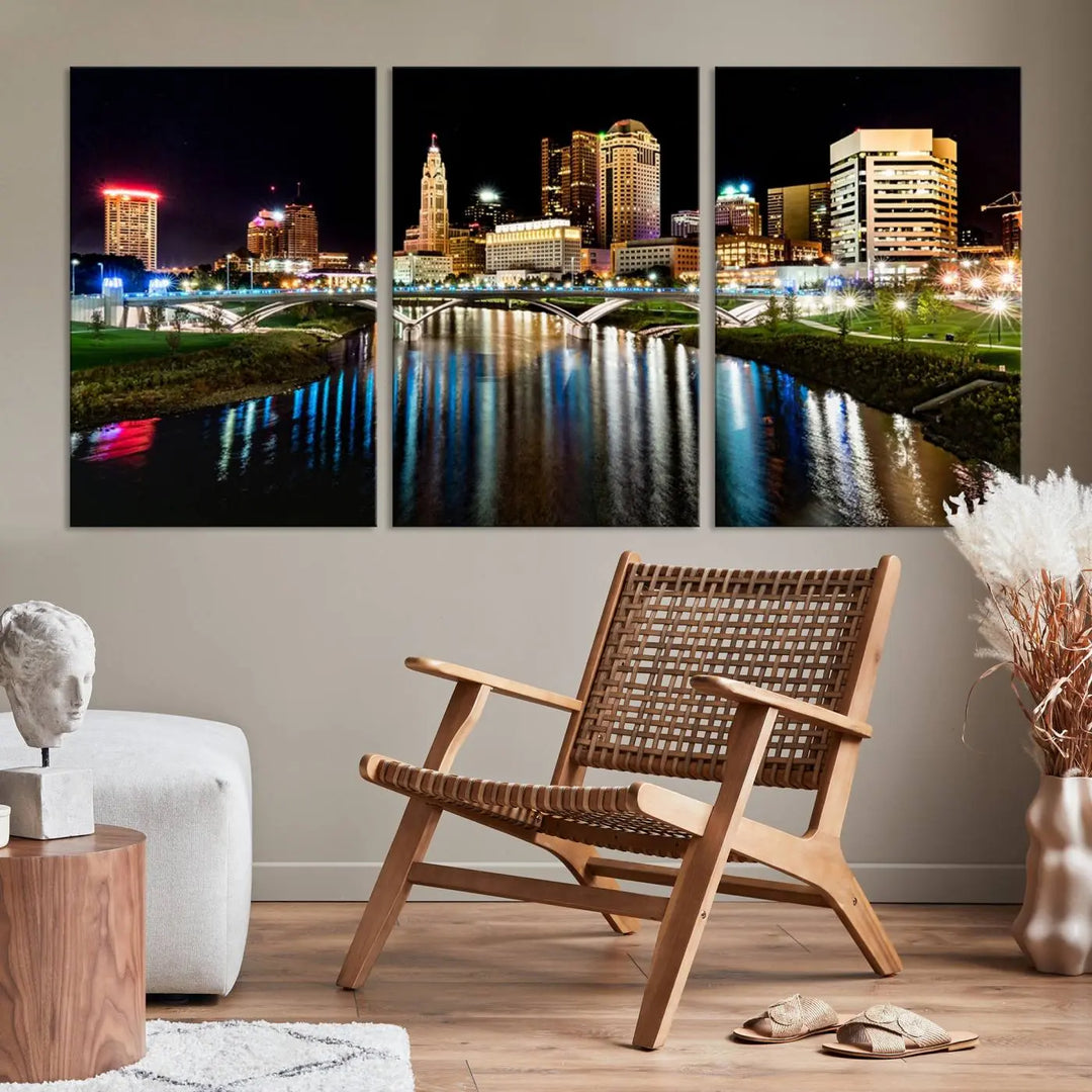 A triptych of the Columbus City Lights Night Skyline Cityscape View Wall Art Canvas Print is displayed, serving as a striking focal point in the room.