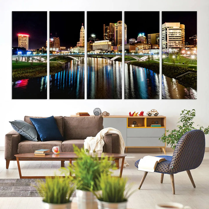 A triptych of the Columbus City Lights Night Skyline Cityscape View Wall Art Canvas Print is displayed, serving as a striking focal point in the room.