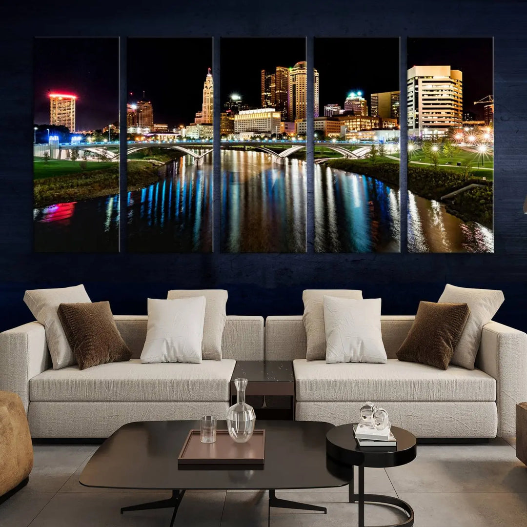 A triptych of the Columbus City Lights Night Skyline Cityscape View Wall Art Canvas Print is displayed, serving as a striking focal point in the room.