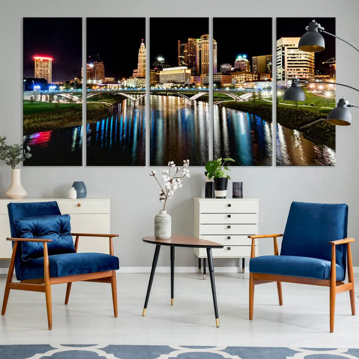 A triptych of the Columbus City Lights Night Skyline Cityscape View Wall Art Canvas Print is displayed, serving as a striking focal point in the room.