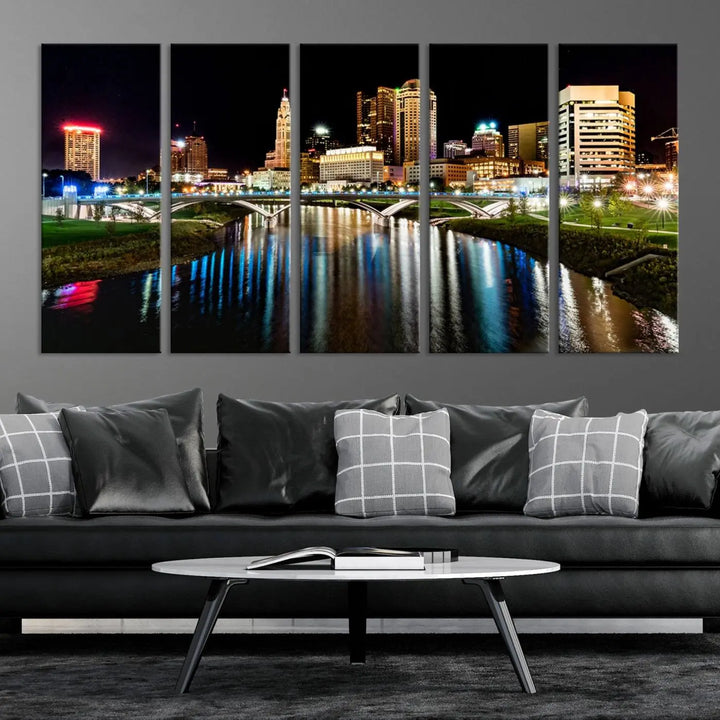 A triptych of the Columbus City Lights Night Skyline Cityscape View Wall Art Canvas Print is displayed, serving as a striking focal point in the room.