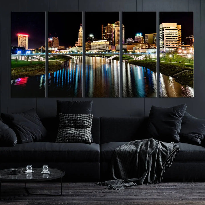 A triptych of the Columbus City Lights Night Skyline Cityscape View Wall Art Canvas Print is displayed, serving as a striking focal point in the room.