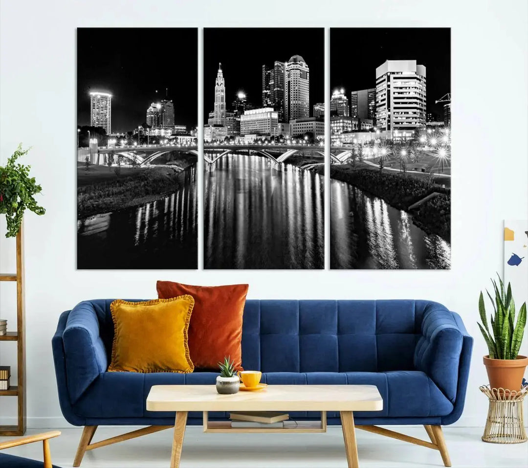 The living room showcases the Columbus City Lights Skyline Black and White Wall Art Cityscape Canvas Print.