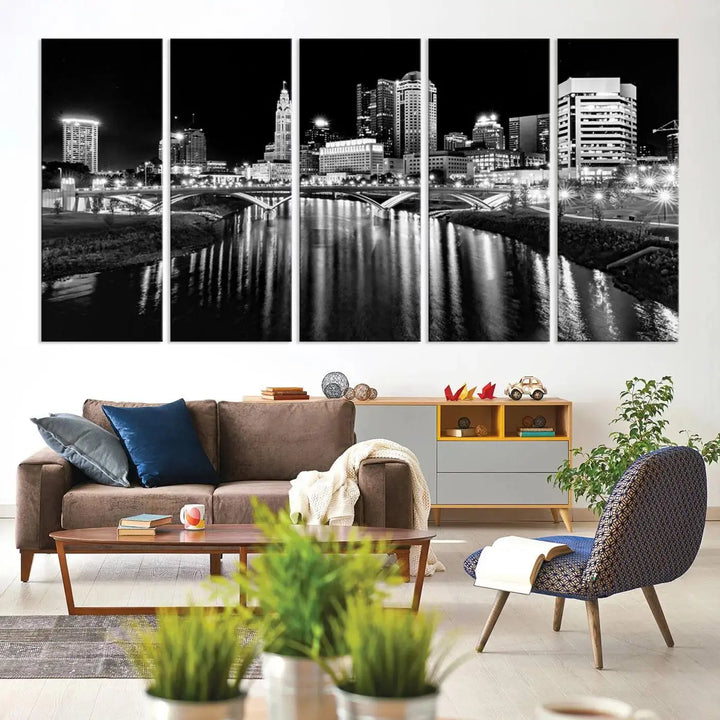 The living room showcases the Columbus City Lights Skyline Black and White Wall Art Cityscape Canvas Print.