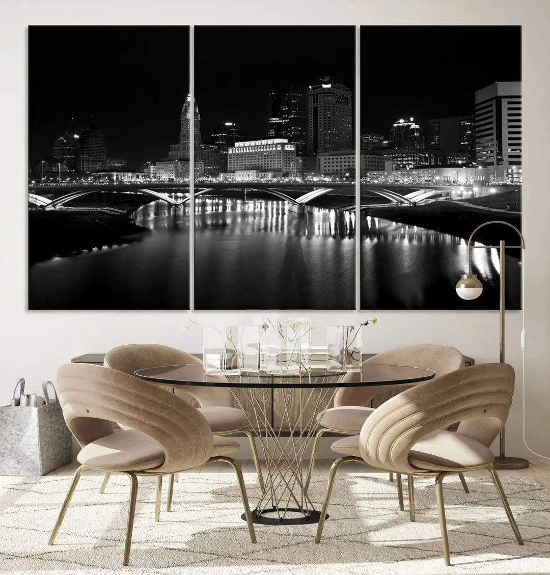 The living room features the "Columbus City Lights Skyline Black and White Wall Art Cityscape Canvas Print" above a coffee table. This artwork is presented as a triptych on museum-quality canvases with UV-protective coating.