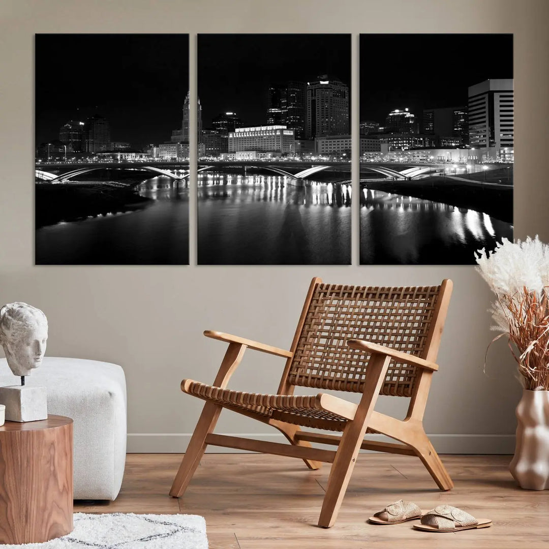 The living room features the "Columbus City Lights Skyline Black and White Wall Art Cityscape Canvas Print" above a coffee table. This artwork is presented as a triptych on museum-quality canvases with UV-protective coating.