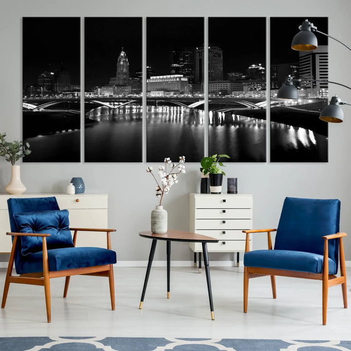 The living room features the "Columbus City Lights Skyline Black and White Wall Art Cityscape Canvas Print" above a coffee table. This artwork is presented as a triptych on museum-quality canvases with UV-protective coating.