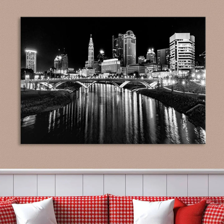 The living room features a Columbus City Lights Skyline Black and White Wall Art Cityscape Canvas Print, framed in hand-assembled frames.