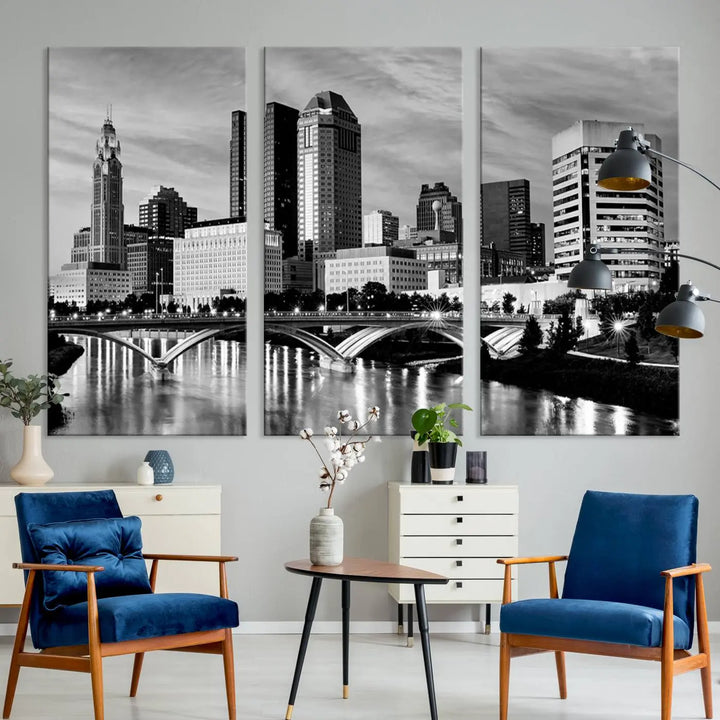 Columbus City Lights Skyline Black and White Wall Art Cityscape Canvas Print, featuring a city skyline over a river, is elegantly displayed.